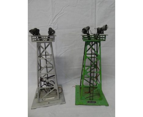 A pair of Lionel O gauge flood light towers, each with four lamps
