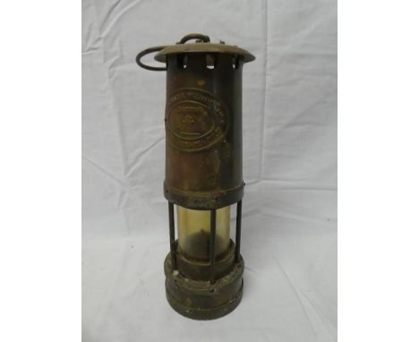 A brass Miner's lamp by E Thomas &amp; Williams Ltd., Aberdare