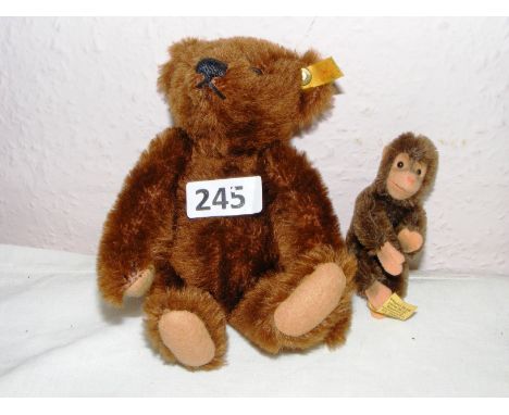 A Steiff Miniature Teddy Bear, #029295, and a miniature monkey #0020/11.