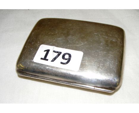 A sterling silver cigarette case hallmarked for Birmingham 1918 measuring 8.5cm wide and weighing 77.4 grams, inscribed on th