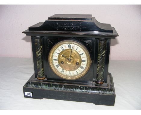 A Hamburg America 14 day mantle clock, made from wood in the marble effect, with a decorative dial, 12.5" tall. CONDITION REP