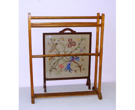 An Arts & Crafts style towel rail, a tapestry fire screen and a framed picture signed by Steven Brown Lee and dated 1988 in a