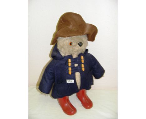 A vintage 1980's Paddington Bear by Film Fair Ltd measuring 21" long. CONDITION REPORT: Good condition. 