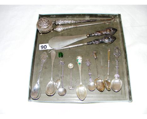 A quantity of sterling silver and white metal items including silver handled button hooks, spoons etc.