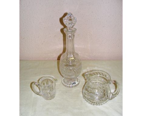 A fine Waterford crystal crystal decanter measuring 14.75" tall, acid marked to the base rim "Waterford", a small Waterford c