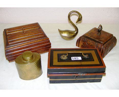 A mixed lot including two wooden cigarette boxes, a brass tea caddy, swan and an early 20th century cash tin.