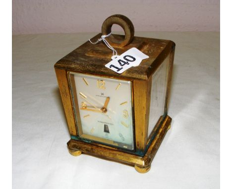 A vintage brass cased Hamilton transistorized weather station barometer hygrometer clock, c.1970's, signed to the dial 'Hamil