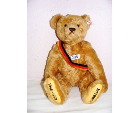 A modern Steiff Herbert 1948-1998 brown mohair bear having white tag and medallion and growling mechanism. CONDITION REPORT: 