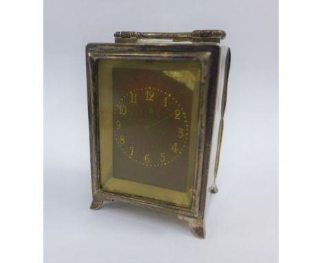 Victorian silver cased miniature clock, Mappin &amp; Webb, London 1899, with swing handle, red enamel dial and Arabic numeral