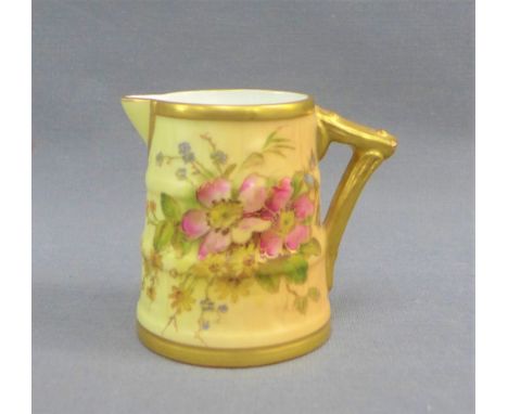 Royal Worcester blush ivory miniature jug with hand painted floral sprays and gilt edged rims, with green printed back stamp,