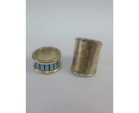 Contemporary London silver gilt ring and a blue and green enamel and silver ring (2) 
