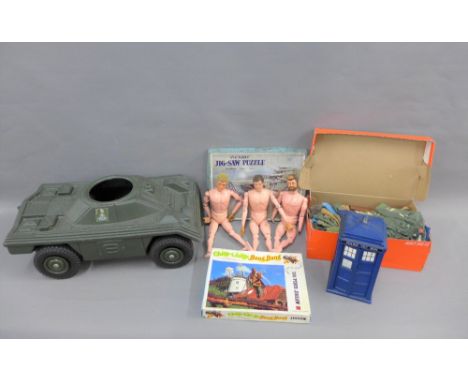 Box containing a collection of vintage Action Man toys with accessories 