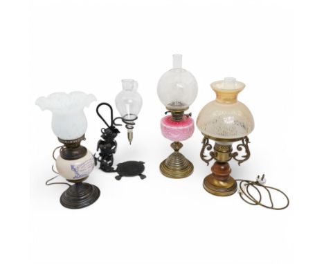 Early 20th century oil lamp, with pink glass reservoir and etched shade, H60cm; with another similar converted to electricity