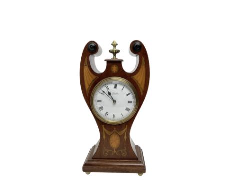 Edwardian - Art Nouveau 8-day mantle clock c1910, with waisted mahogany case, fine inlaid marquetry work and cast brass finia