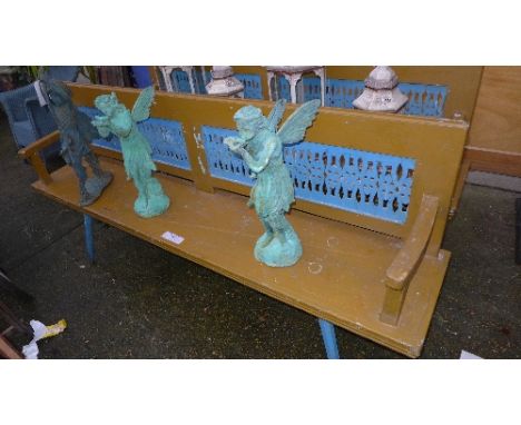 A fruitwood pierced back conservatory bench