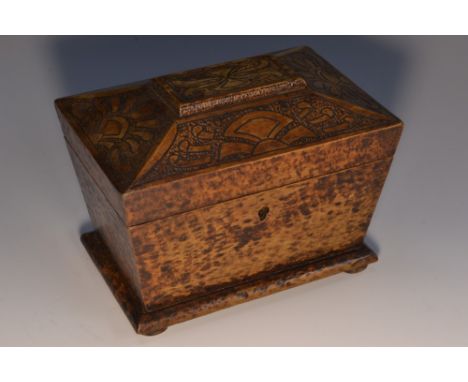 A Victorian pyrography sarcophagus tea caddy, hinged cover enclosing a pair of lidded compartments, decorated overall with 'p
