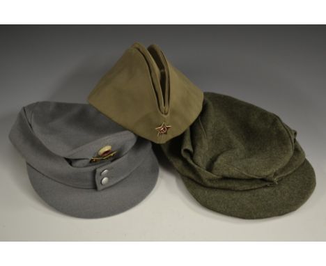 Militaria - a Highlander's khaki tam o' shanter, with pom pom; a German Bundeswehr drab grey 1999 Bergmutze cap; another, ear