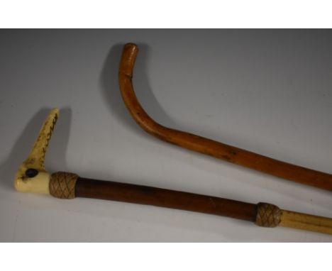 An Edwardian bamboo and leather riding crop, by C. Griffith, London, stag antler handle, 74cm long, c. 1910; walking stick (2