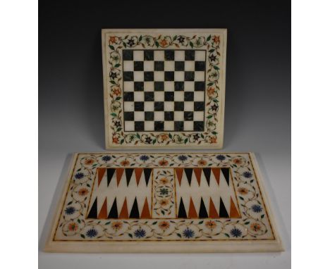 An Indian pietra dura and white marble square games board, inlaid for chess, within a border of flowers and leafy tendrils in