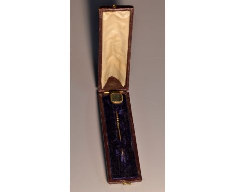 Judaica - a 19th century gold coloured metal mounted stick pin, set with a canted rectangular blood agate seal matrix inscrib