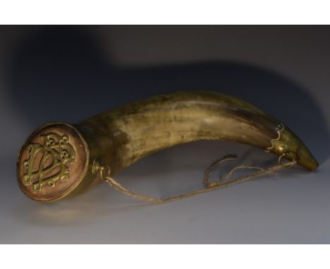A large 19th century Scottish cattle horn powder flask, 'scrimshaw' engraved with a Highlander taking a drink, the top applie