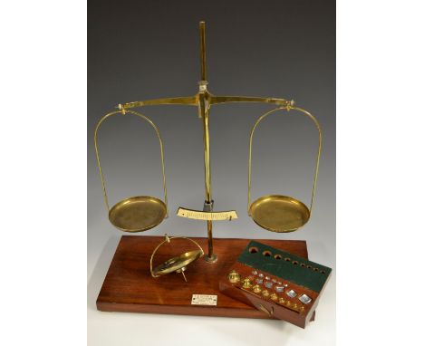 A set of Edwardian mahogany and brass scientific balance scales, by F E Becker & Co, London, brass pans, a steel indicator po