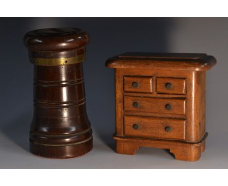 A 19th century mahogany novelty money box, as a miniature chest of drawers, oversailing rounded rectangular top, bracket feet