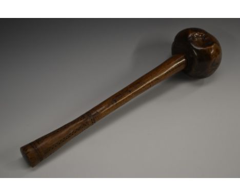 Tribal Art - a Fijian ula, bulbous root ball head, the grip carved with geometric bands, 42cm long, early 20th century