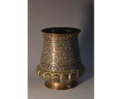 A Kashmiri enamel and gilt copper beaker, profusely chased in the Indo-Persian taste with scrolling foliage and decorated in 