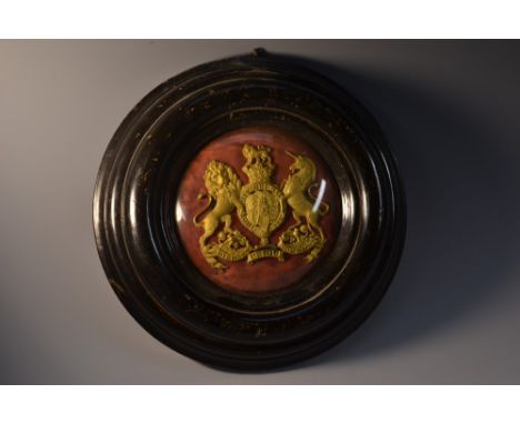 A Victorian gilt metal helmet plate, as the Royal Coat of Arms and motto Honi Soit Qui Mal Y Pense and Dieu et Ubique Mon Dro