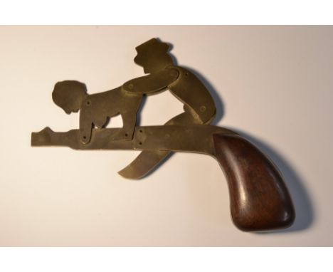 Erotica - a 19th century pistol-form automaton novelty, depicting a well acquainted couple, two-piece mahogany grip, 19cm lon