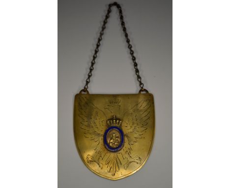 A 19th century Polish-Lithuanian brass and enamel gorget, centred by a plaque of Our of Lady Ostrabrama, crested by an imperi