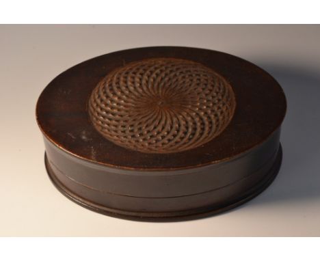 A 19th century mahogany oval snuff or specimen box, push-fitting cover with engine turned roundel, 12.5cm wide