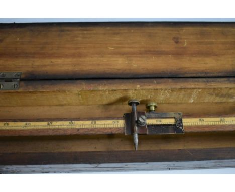 A World War I military boxwood, mahogany and brass marking gauge, by R J Hopgood & Co, London, marked out to 52", steel spike
