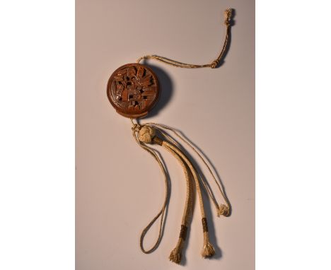 A Chinese boxwood travelling compass, the bun shaped sleeve pierced and carved with lotus leaves, 4cm diam, c.1900