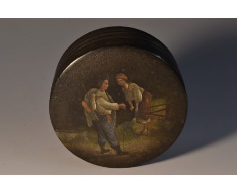 A 19th century Russian lacquer circular table snuff box, the cover painted with a peasant man and woman at a stile, 8cm diam,