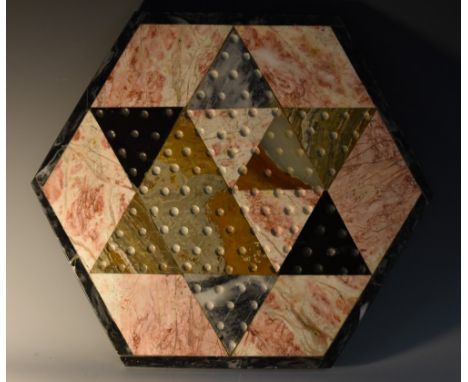 A specimen marble Chinese checkers board, of typical hexagram form, 37cm wide 