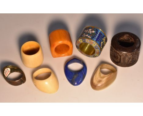 A Chinese lapis lazuli archer's thumb ring, 4cm wide; others, horn, cloissoné enamel, etc (8)    Condition Report:  Good over