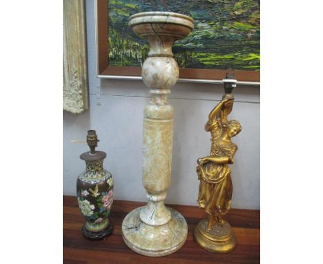 An alabaster pedestal with a turned column, a gilt plaster figural lamp, and a Chinese cloisonné lampLocation: 