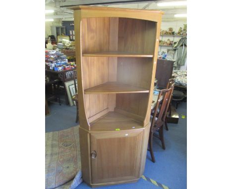 An Ercol elm Windsor range corner display unit having open shelves above a single cupboard door, 179h x 76wLocation: RAF 