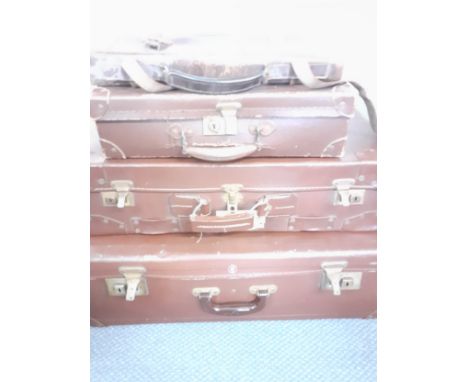 Vintage brown suitcases A/F and a vintage briefcase.Location: RAB 