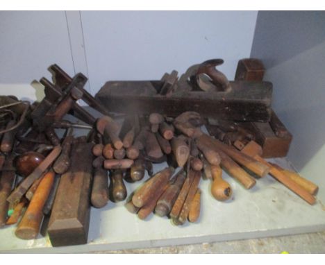 A selection of tools to include wood working planes, chisels and other itemsLocation: 