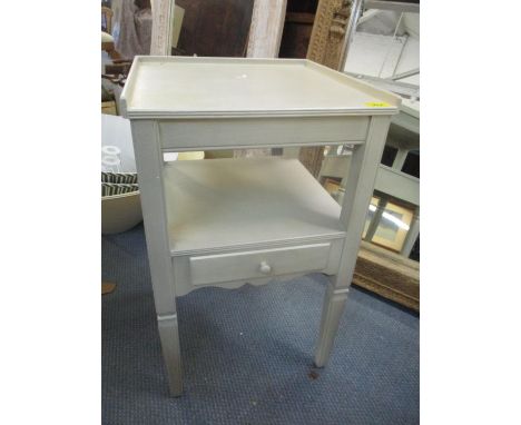 A modern painted two tier lamp table with single inset drawer and on square, tapered legs, together with a three drawer chest