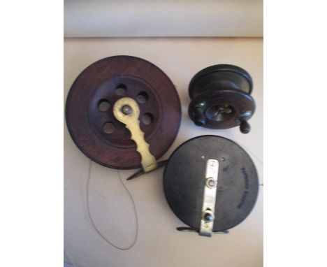 An Allcock wooden and brass reel, an Eton Sun reel and an Allcock Aerialite reel, together with four matchstick models of a s