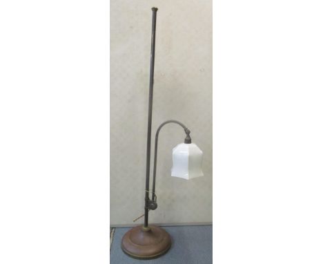 An early 2th century brass and copper adjustable reading lamp, 107cm hLocation: 