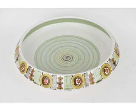 A large Langley ware ceramic fruit bowl, of circular form with inverted rim and a matt glaze with painted decoration, 31 cm d