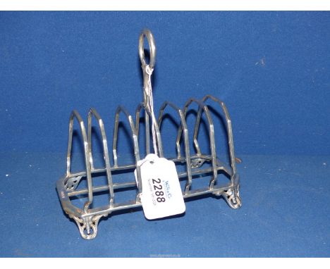 A large Victorian Silver toast Rack, Sheffield 1858, maker Henry Wilkinson & Co, 7" long x 6" high, 349g.