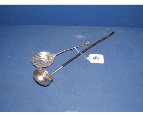 An unmarked silver toddy Ladle with twisted handle and an ornate Silver Spoon with shell bow and twisted handle, London 1897.