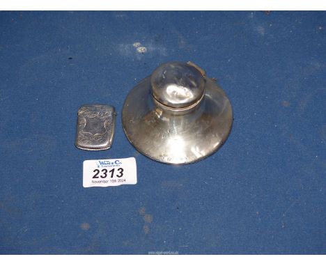 A Silver Vesta, Birmingham 1910, makers Arthur Barnett & Co Ltd. and a Silver Inkwell Birmingham possibly 1913, (some dents).