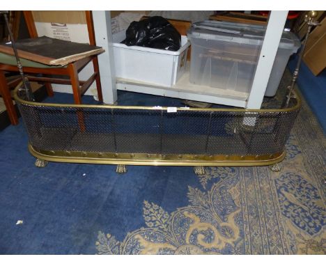 A very good Regency brass and iron mest fireside Fender, unusually complete with side posts and the original tools, each with